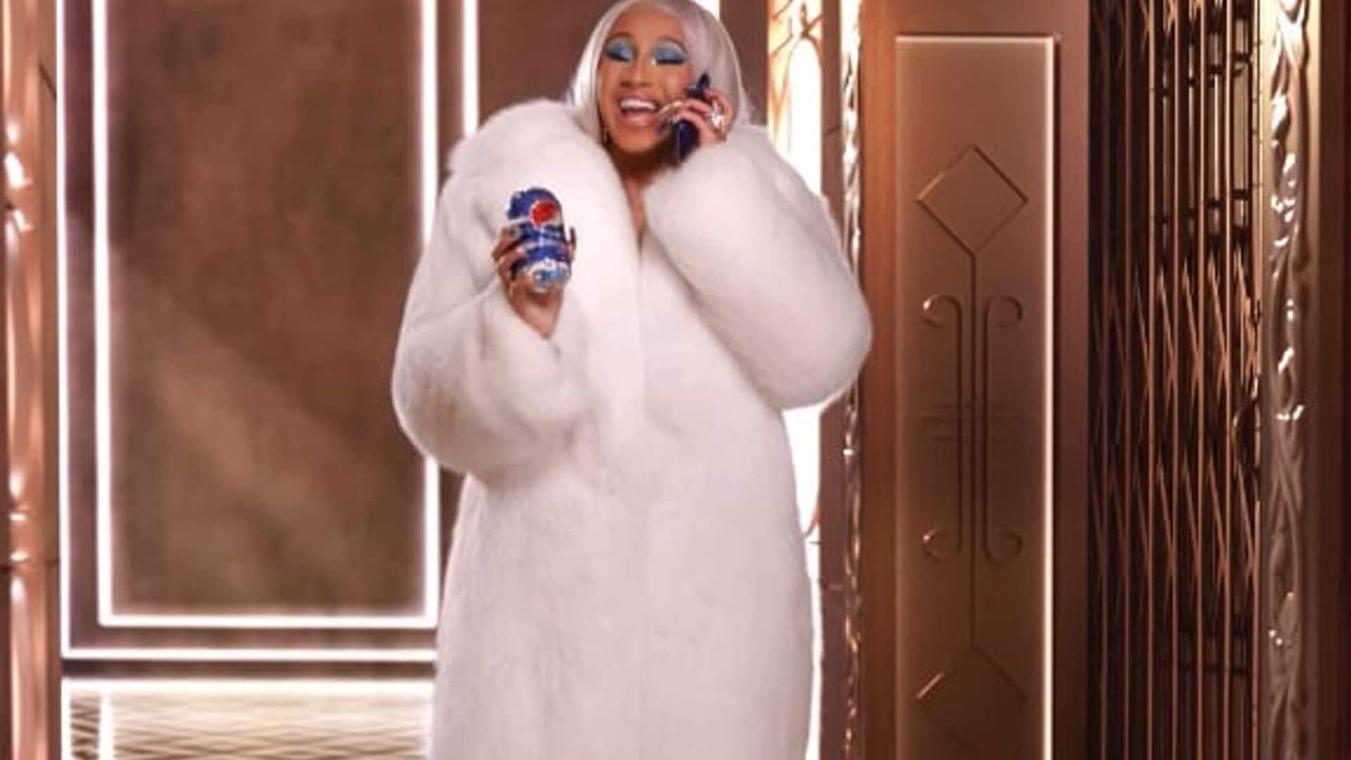 Cardi B channels Santa Claus and passes out her favorite gift in hilarious Pepsi commercial