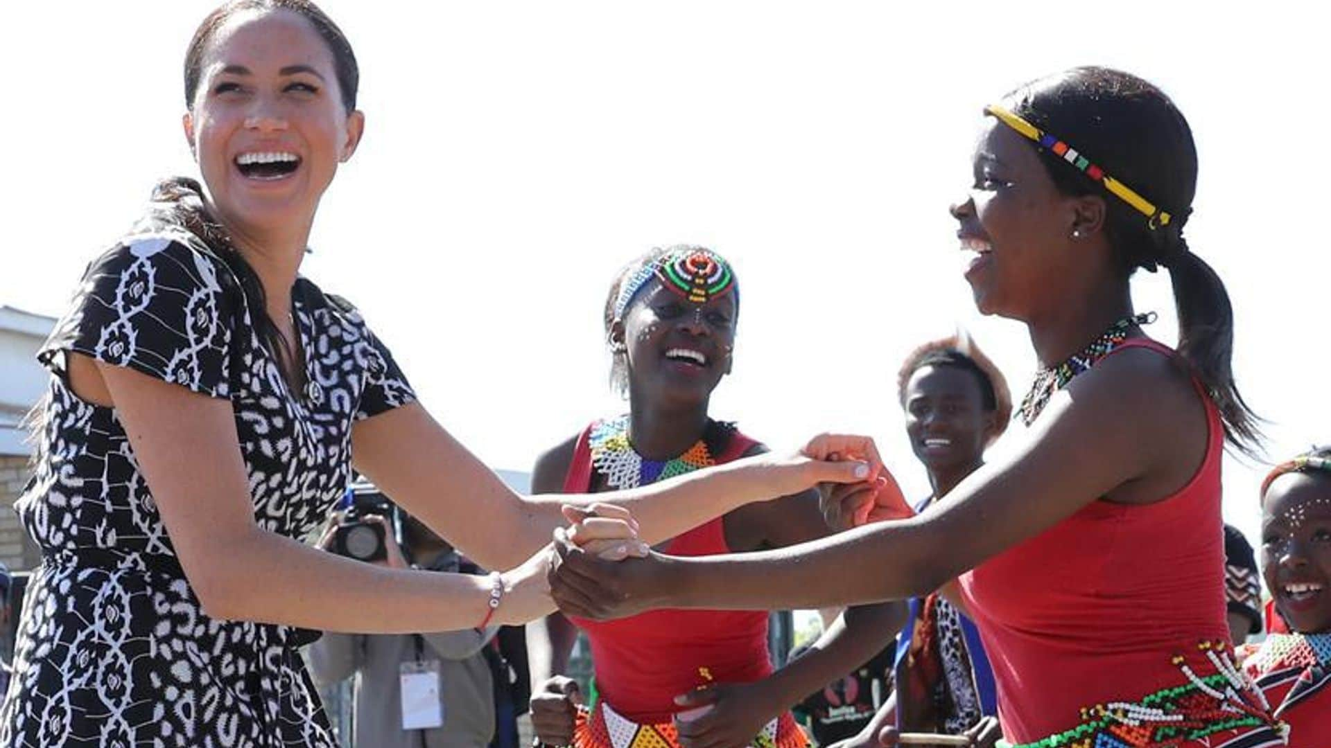 Dancing Duchess Meghan says she is visiting Africa as 'a woman of color'