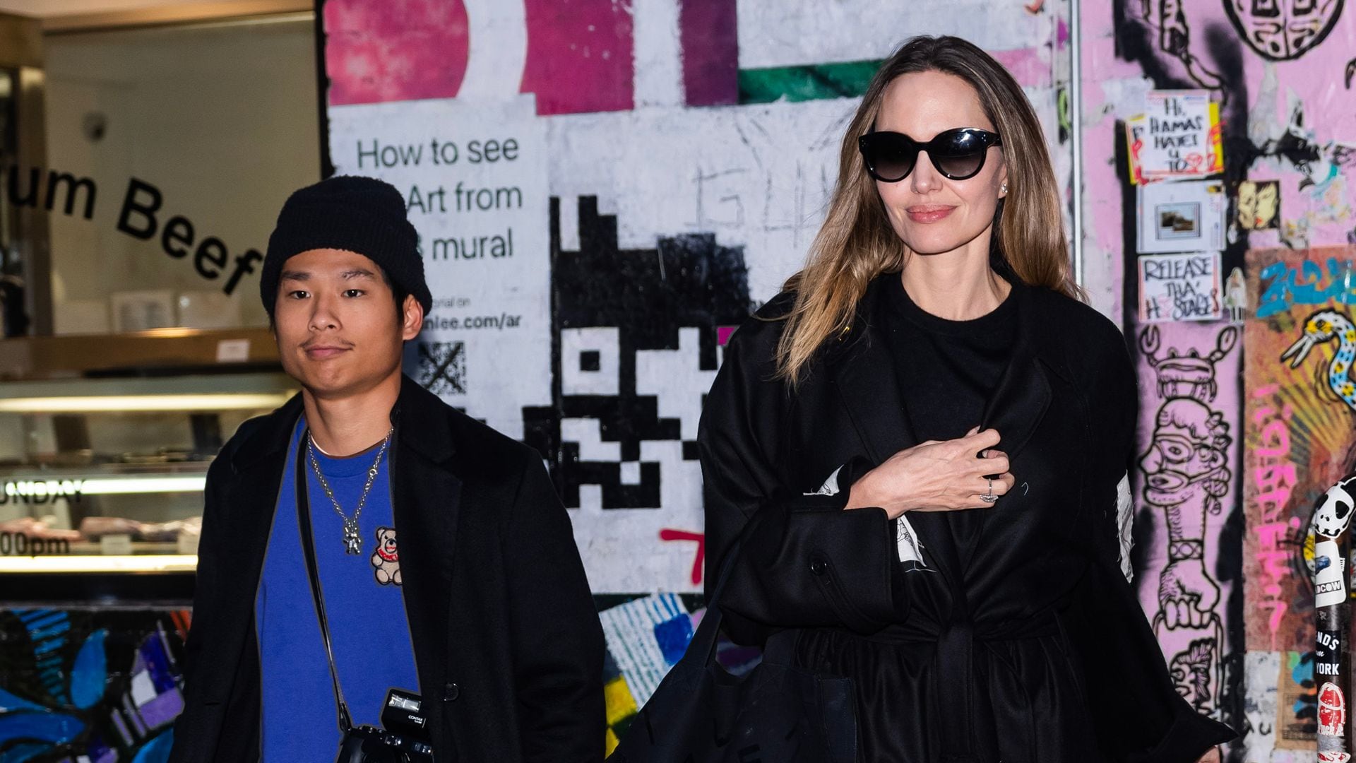  Pax Jolie-Pitt (L) and Angelina Jolie are seen in New York City in the East Village on December 28, 2023. (Photo by Gotham/GC Images)