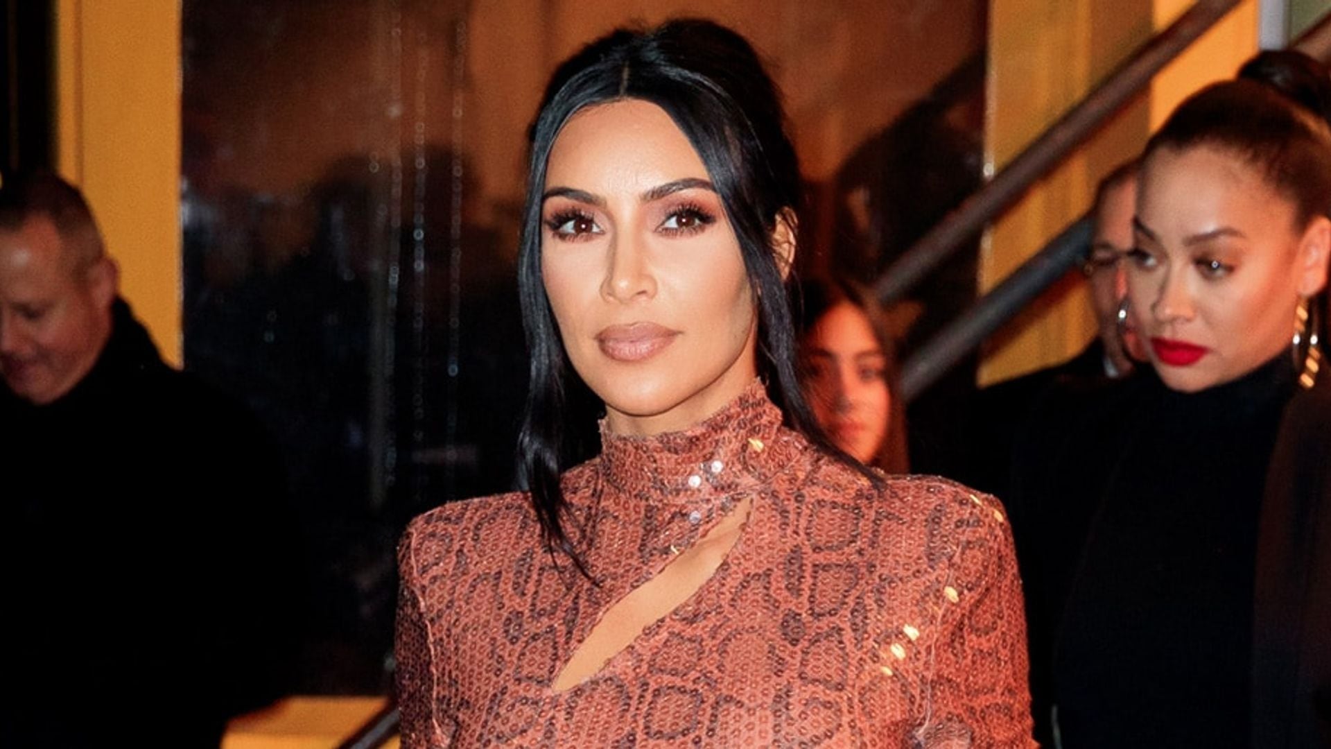 Kim Kardashian stuns in daring unitard as she celebrates opening of center named after her late father