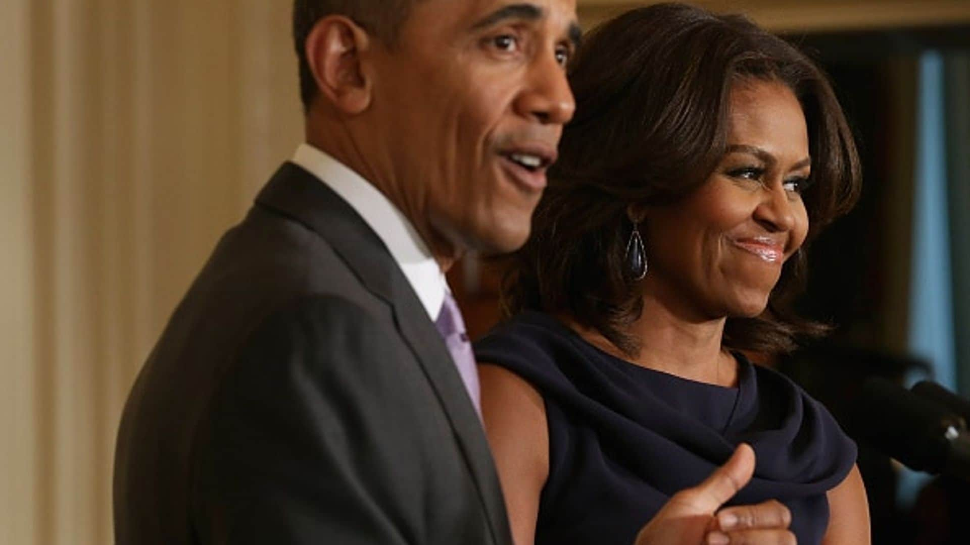 Michelle Obama: Barack 'doing well' when it comes to his daughters and boys