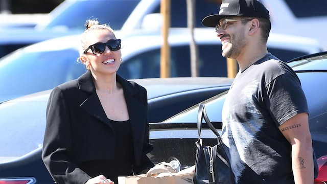 Miley Cyrus and friend in LA