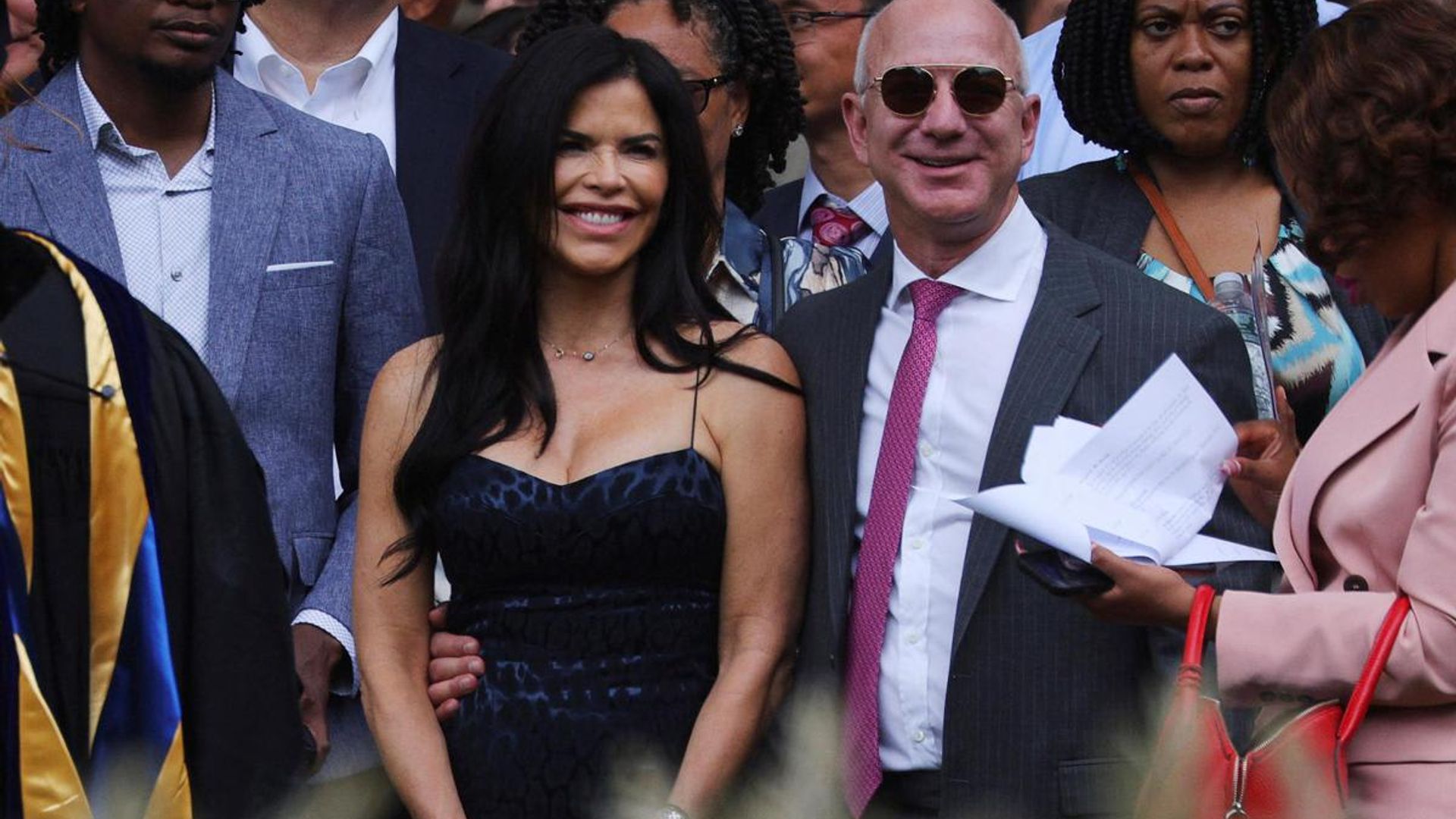 Jeff Bezos & Lauren Sanchez smile at MIT commencement ceremony