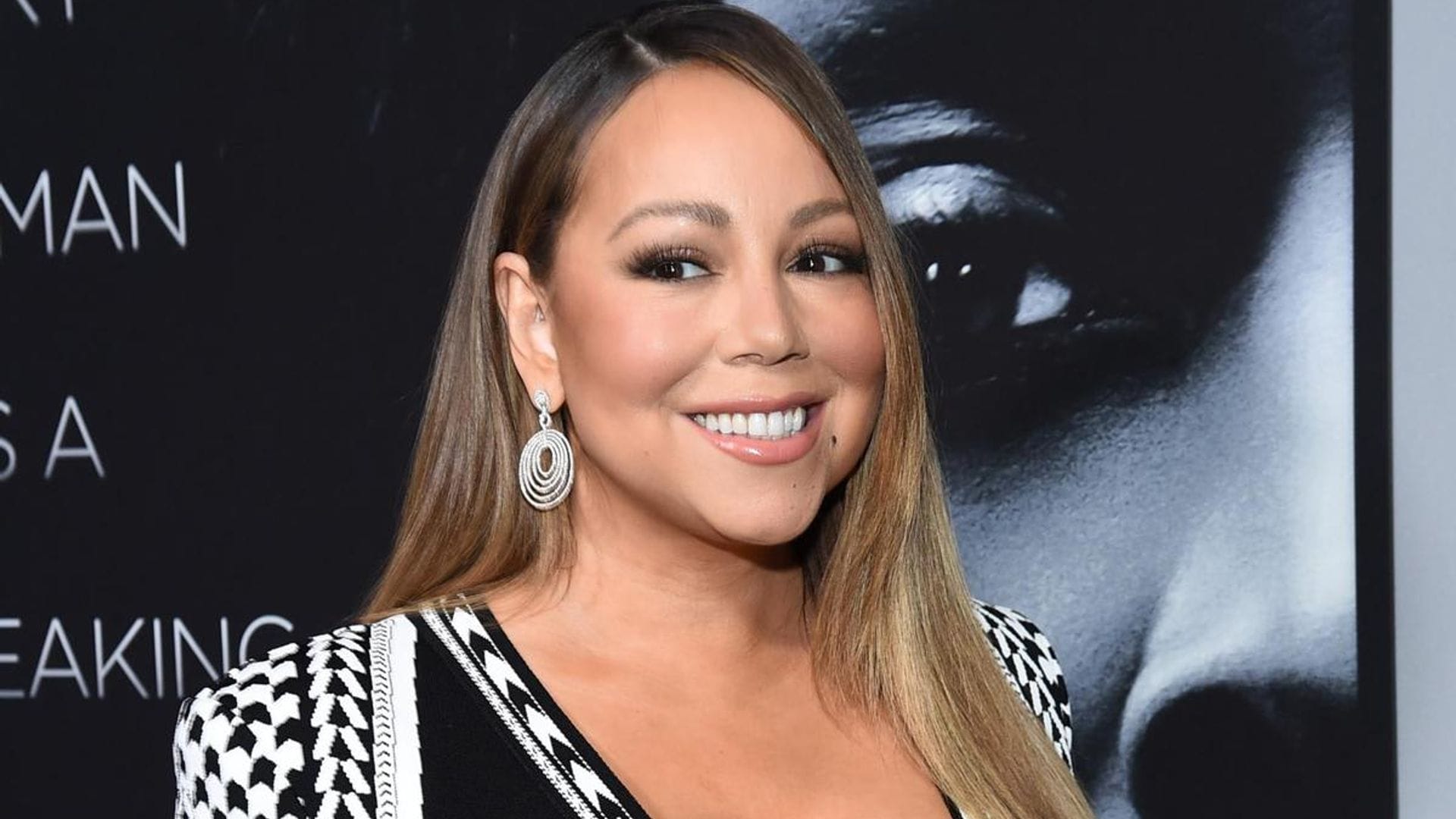 Mariah Carey goes on a movie date with boyfriend Bryan Tanaka wearing a sequined mini dress