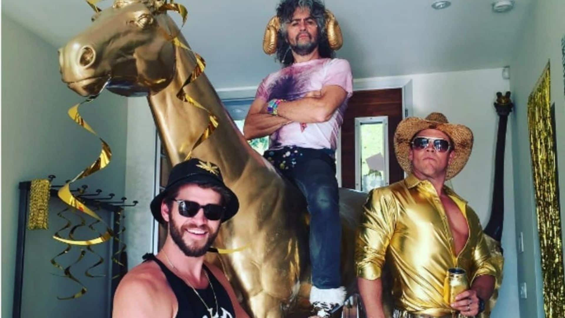 Miley Cyrus and Liam Hemsworth are a golden couple at family birthday bash