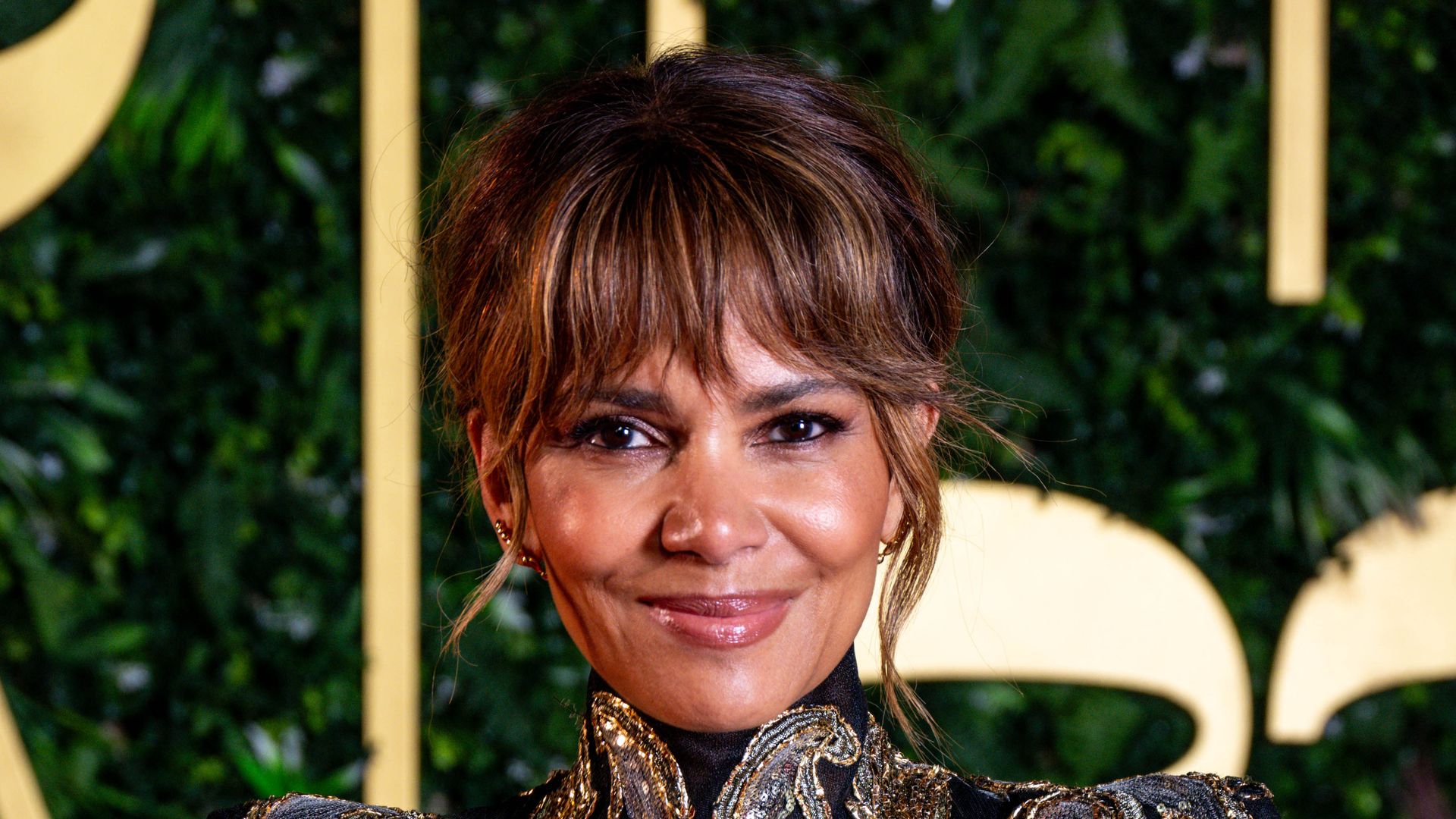 Halle Berry celebrates the 20th anniversary of 'Catwoman' with a topless photoshoot