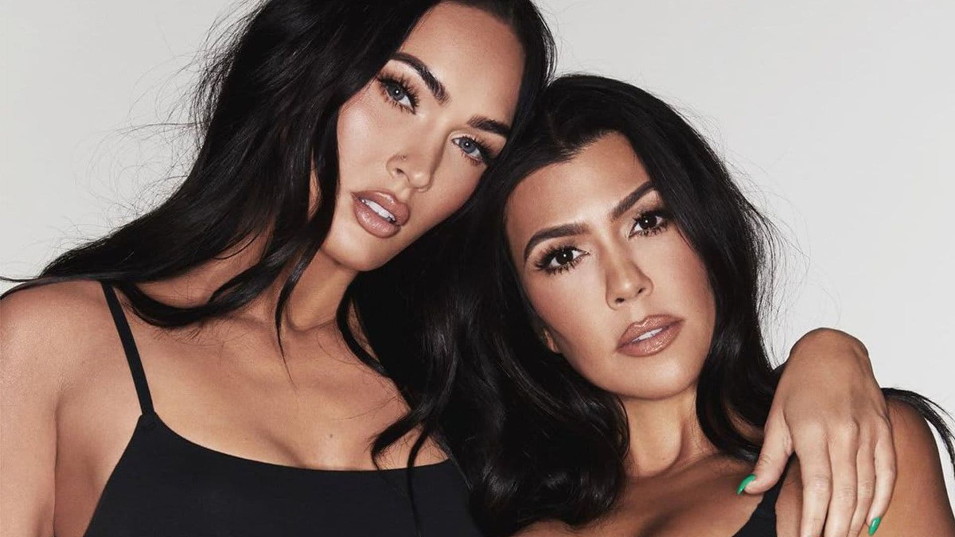 Megan Fox and Kourtney Kardashian pose for SKIMS