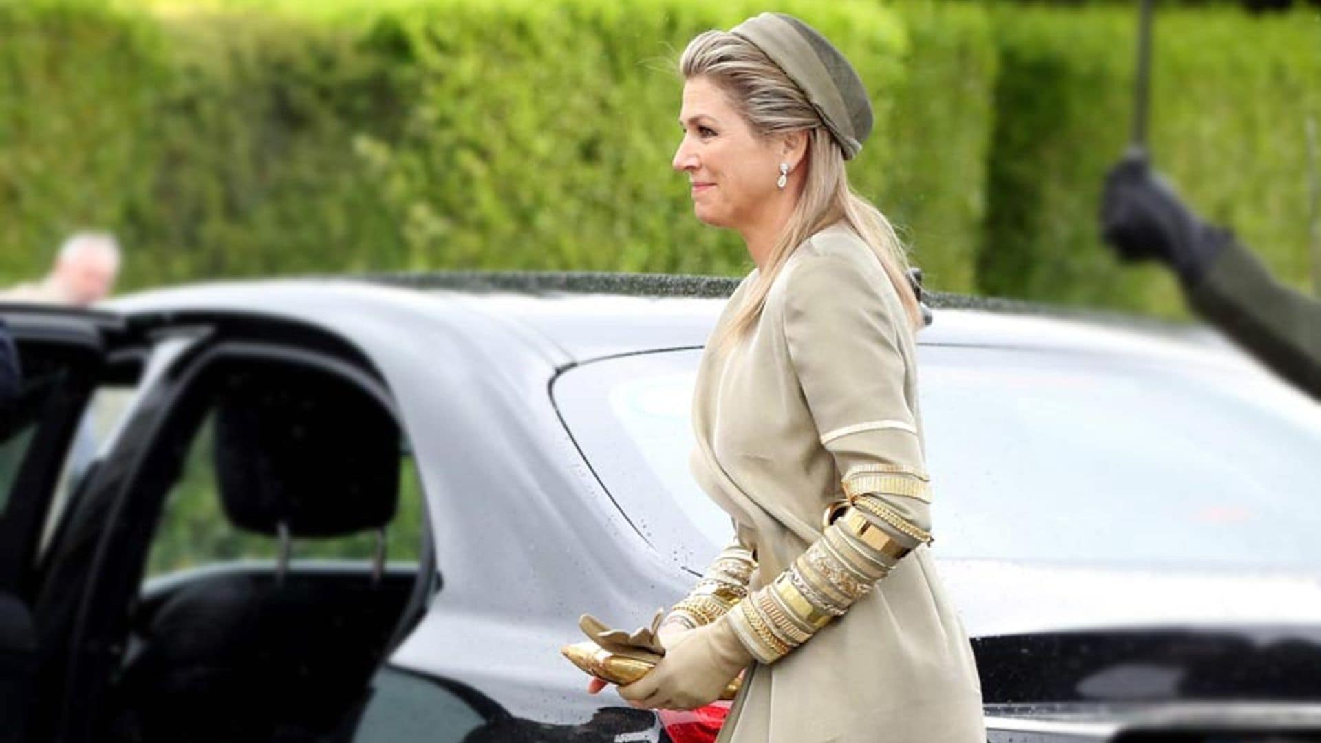 Queen Maxima's boldest look: who needs accessories with a dress like this?