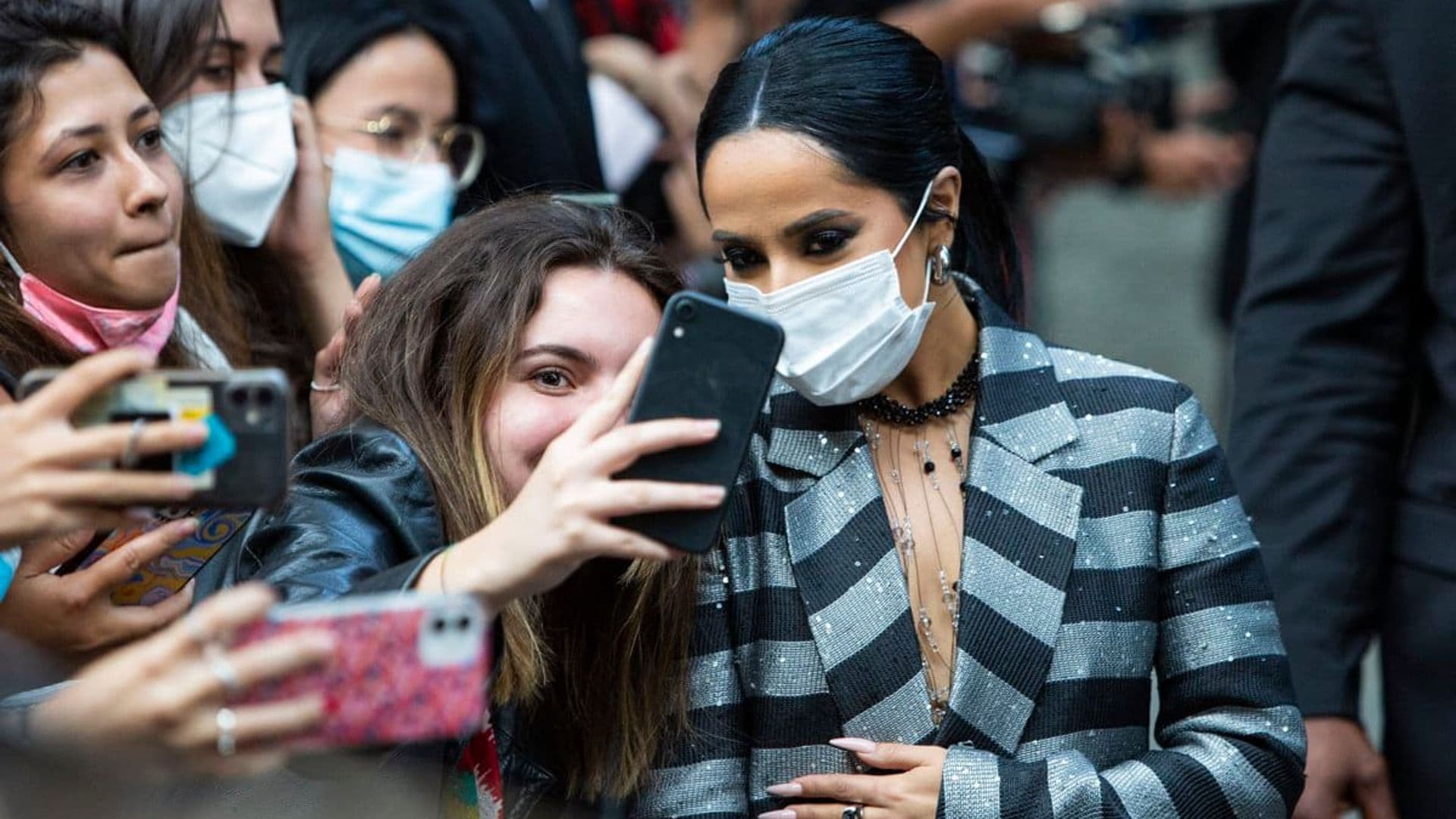 Becky G wore a trendy oversized pantsuit front row at Milan Fashion Week