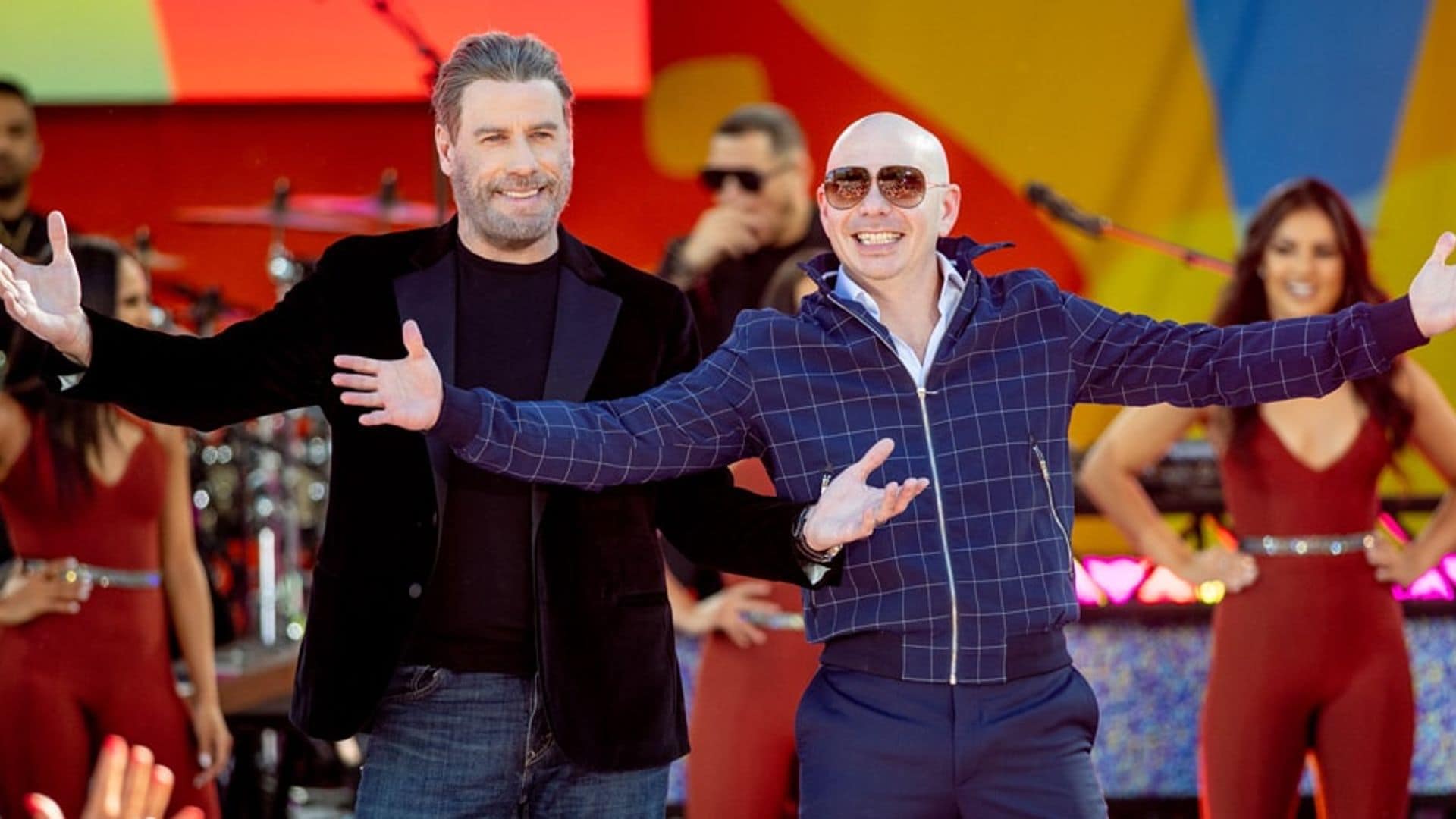 John Travolta pulls the ‘ultimate switch’ in Pitbull’s '3 to Tango' music video