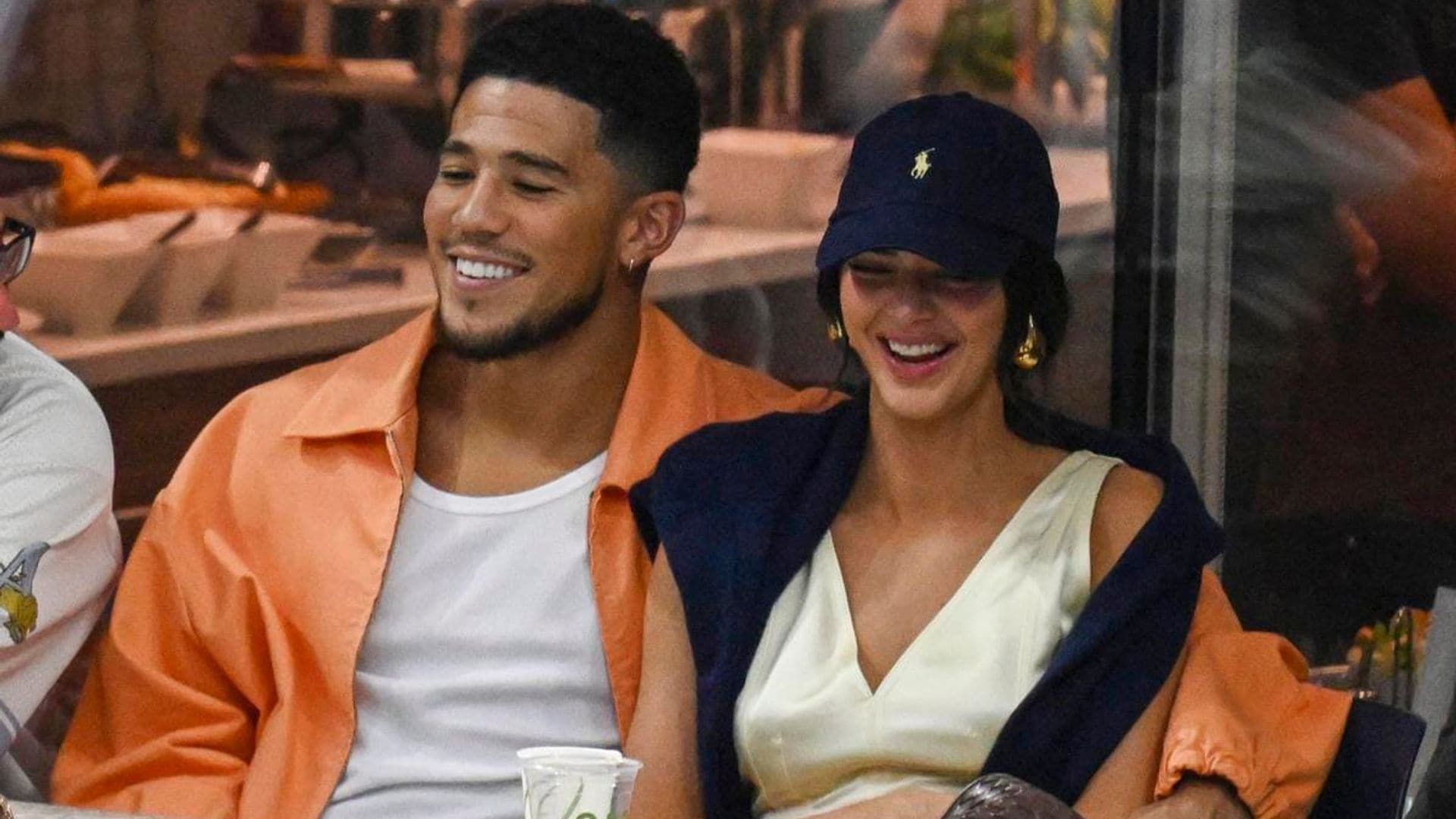 Kendall Jenner and Devin Booker kiss and cuddle at U.S. Open