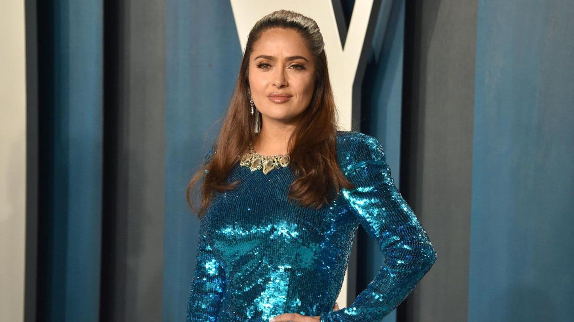 Salma Hayek hilariously spills water on rapper Eminem backstage at the Oscars - see the photos!