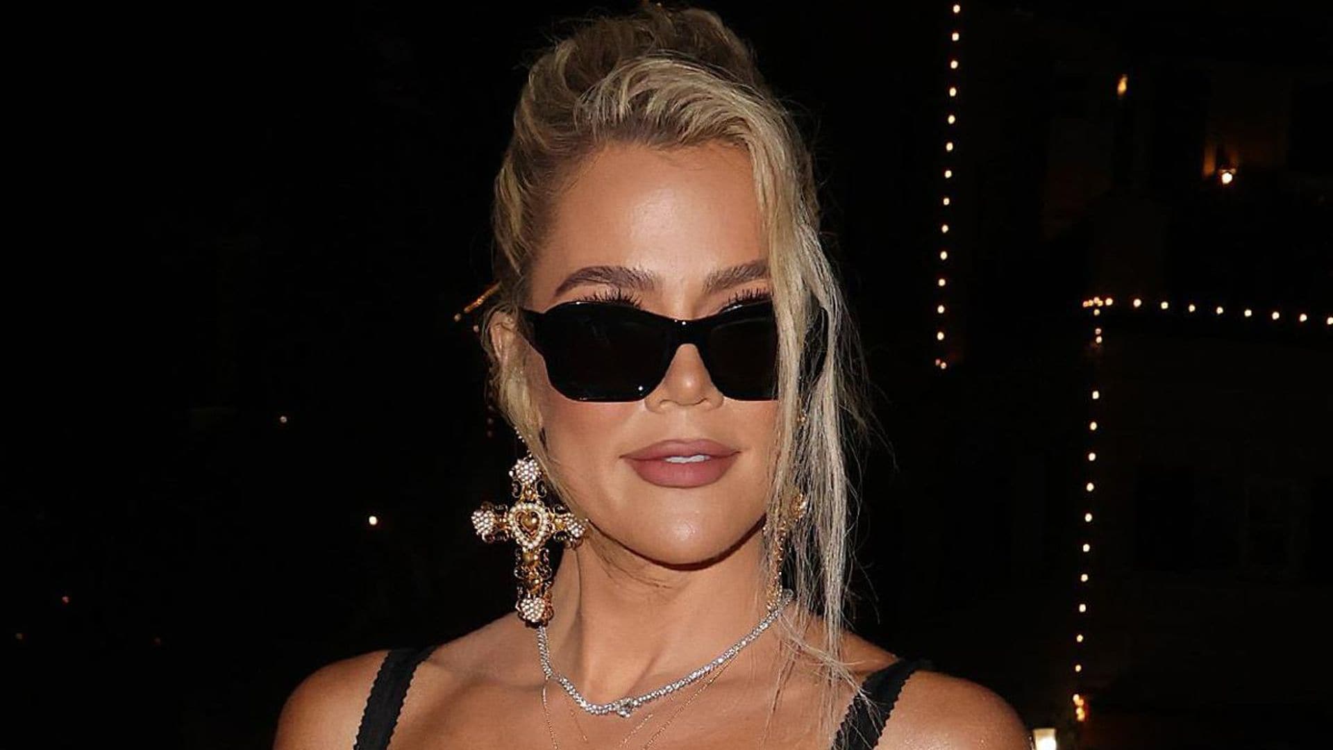 Khloé Kardashian and True Thompson pose in matching Dolce leopard looks
