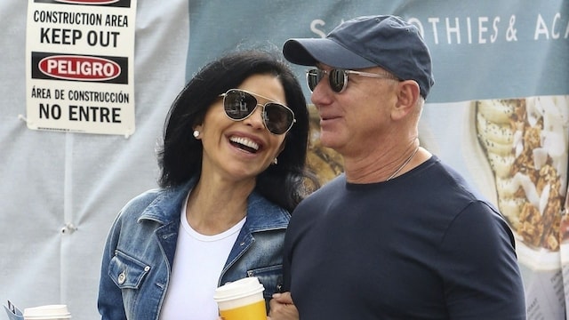 Jeff Bezos and his fiance, Lauren Sanchez, enjoy President's Day at the Coconut Grove Arts Festival in Miami, Florida. Lauren shows off her midriff in a white top and green cargo pants, while Jeff is dressed classic in a black t-shirt and blue jeans. Jeff and Lauren seemed happy sharing some inside jokes as they spent less than an hour inside the art festival. They both enjoyed a tasty coffee and an afternoon of romance in Miami.
