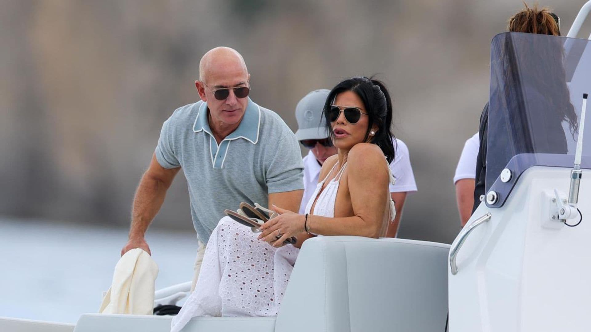 Lauren Sanchez wears a white beach dress in Ibiza with Jeff Bezos