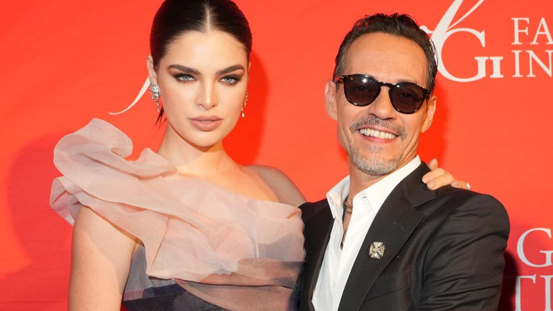 Marc Anthony attends the Balmain show to cheer on his wife Nadia Ferreira