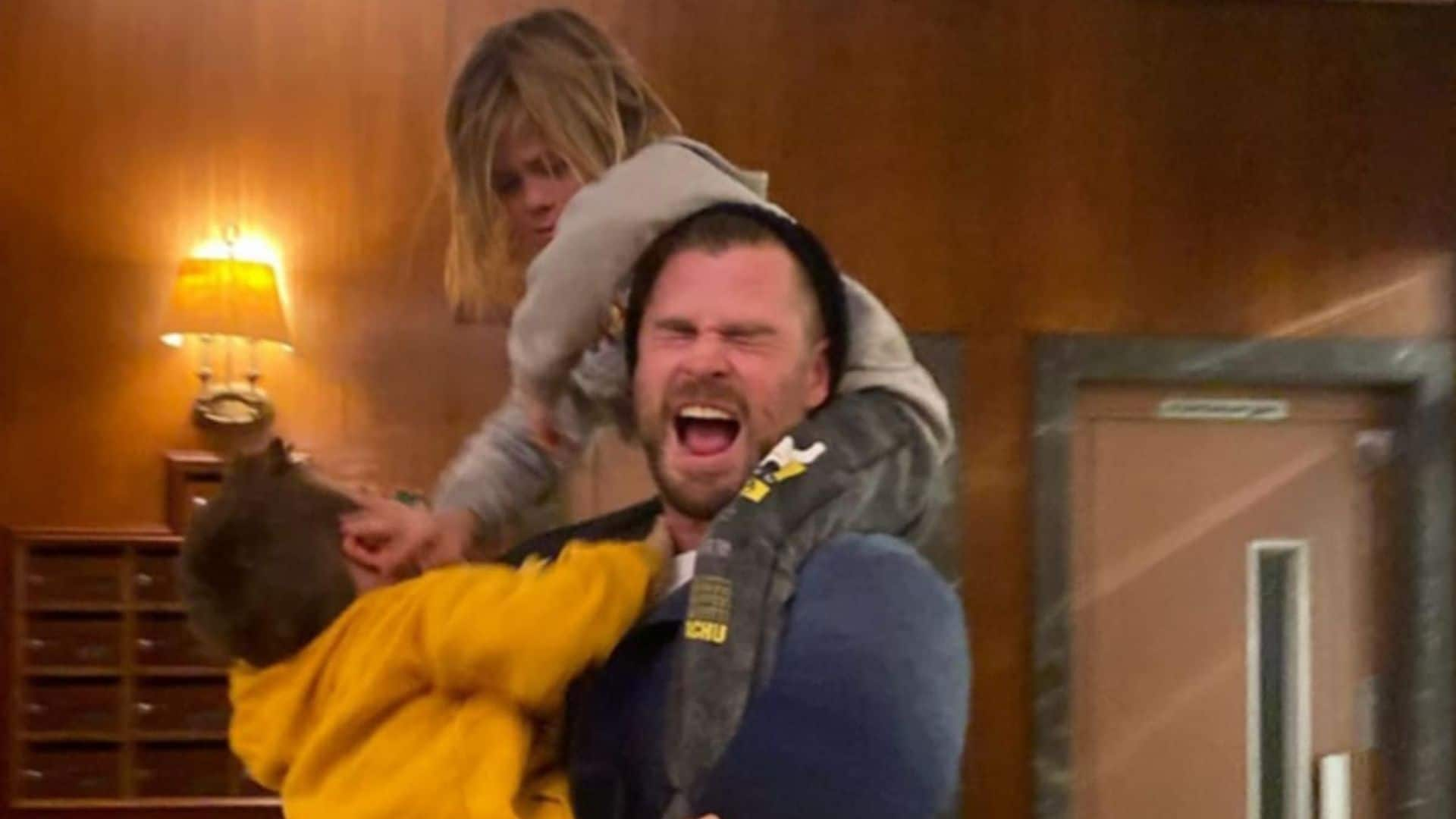 Elsa Pataky shares a photo of Chris Hemsworth being attacked by their kids