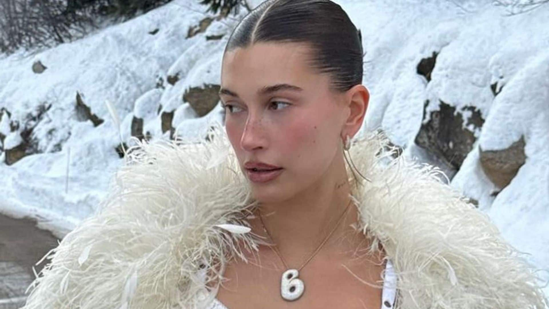 Hailey Bieber’s winter outfit includes fuzzy thong bikini and matching boots