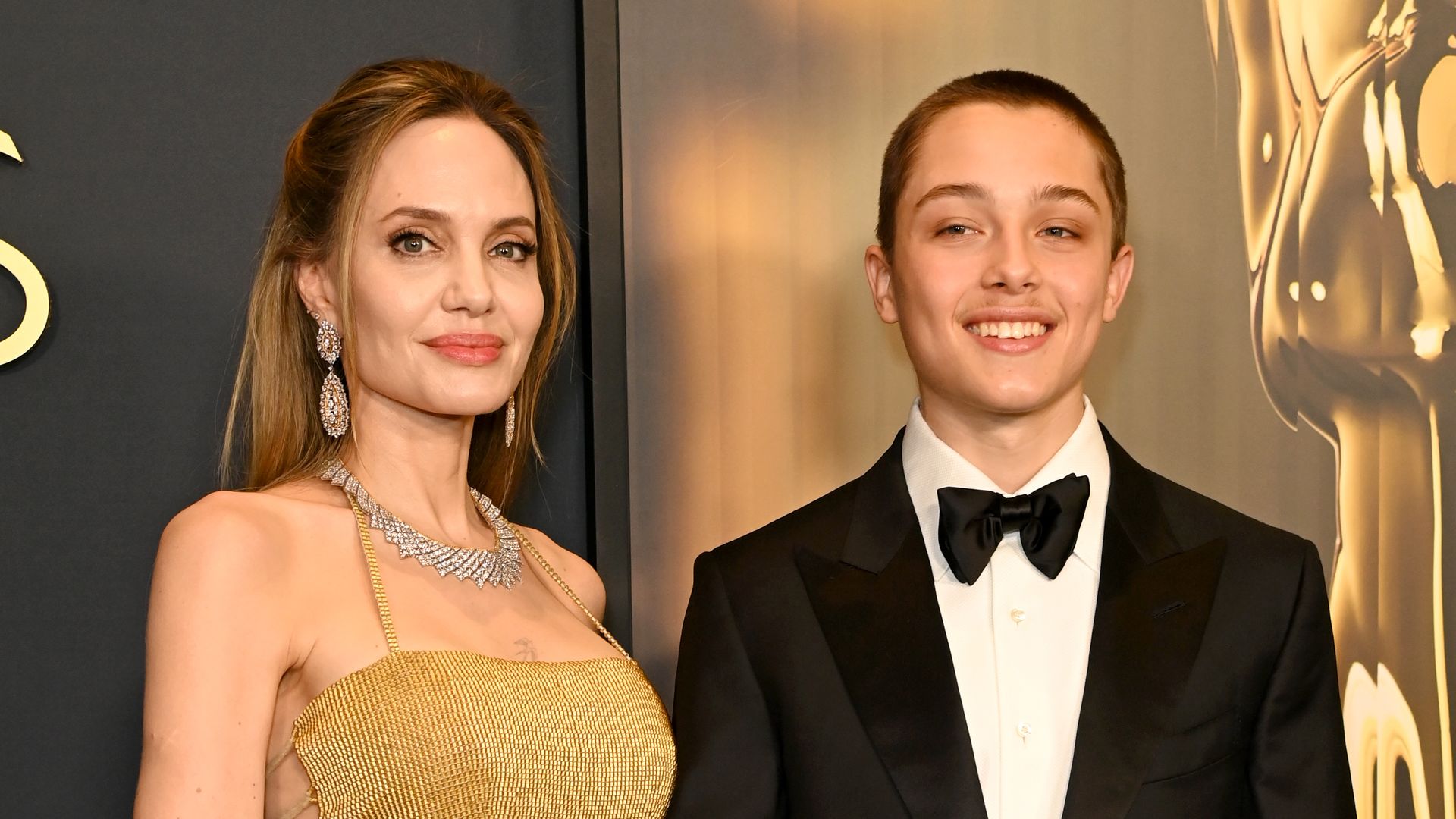 Angelina Jolie and her son Knox step out for a rare red carpet appearance at the Governor's Awards