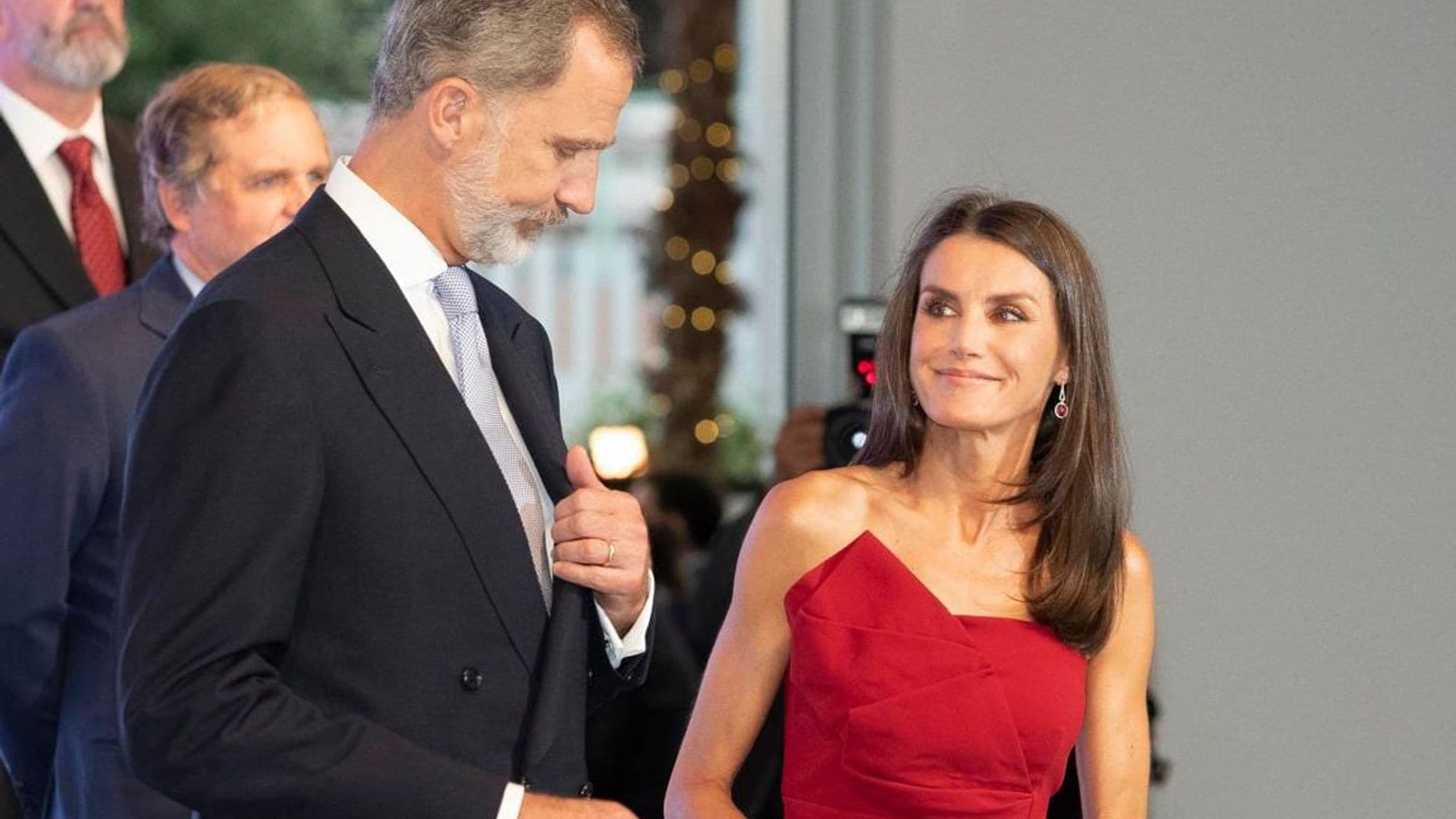 Queen Letizia stuns wearing a cocktail dress with a face mask