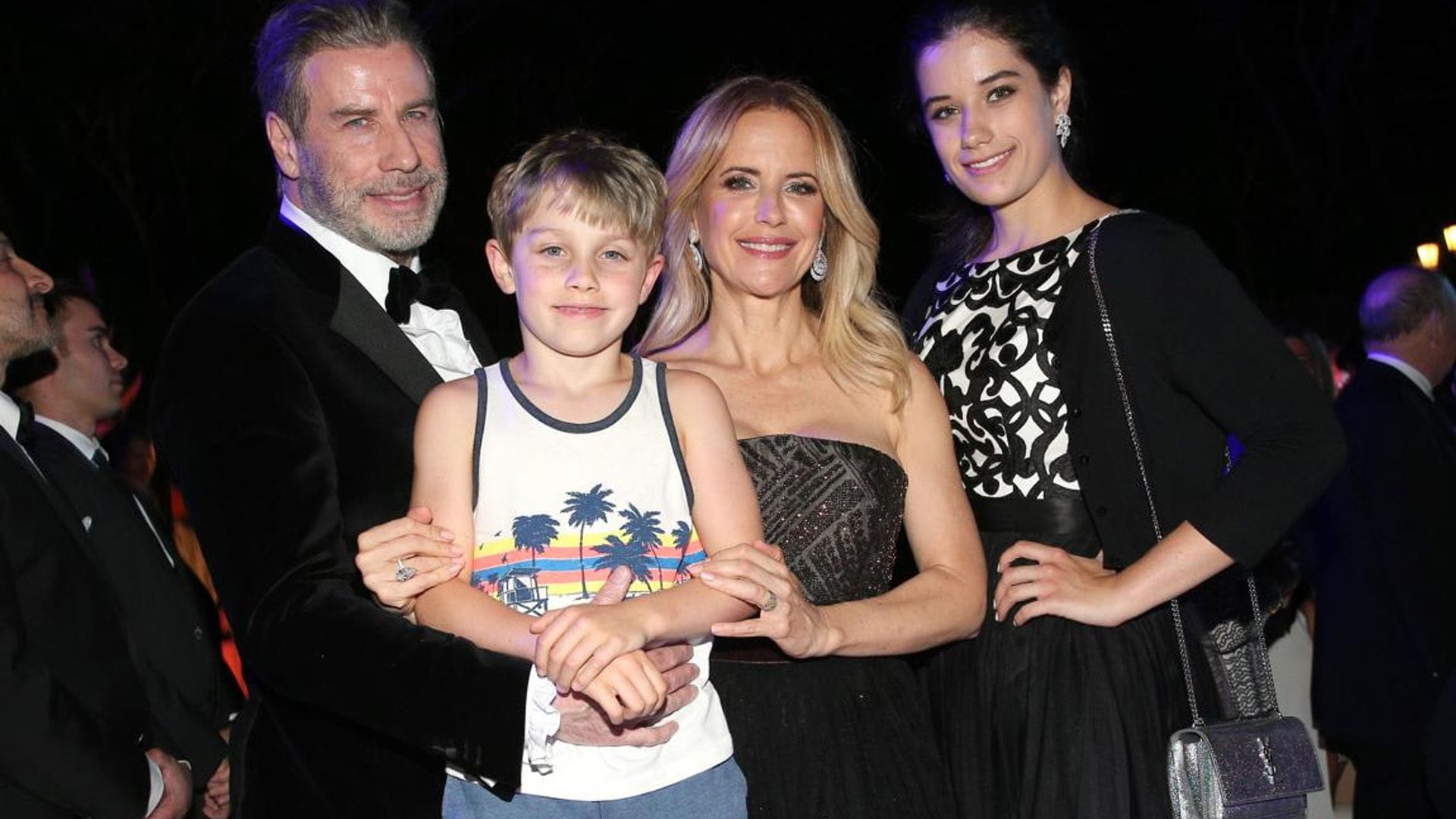 John Travolta shares rare family photo with both of his lookalike kids