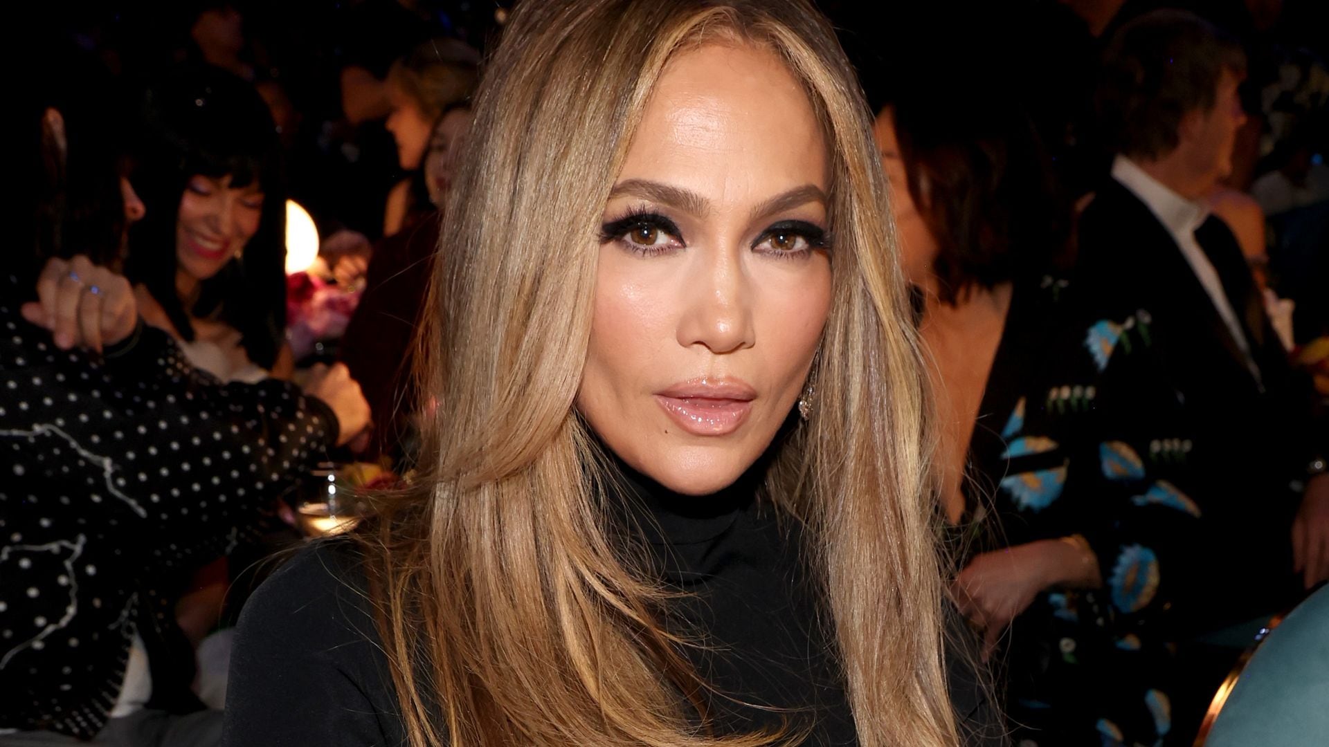 Jennifer Lopez makes surprise appearance at the Grammys in sparkly sheer  skirt