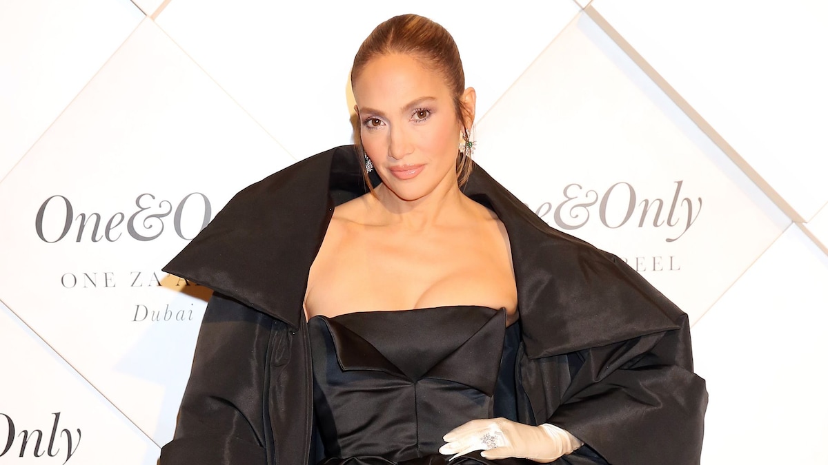 Jennifer Lopez wears sexy silky red shirt dress and festive hoops on Christmas Eve