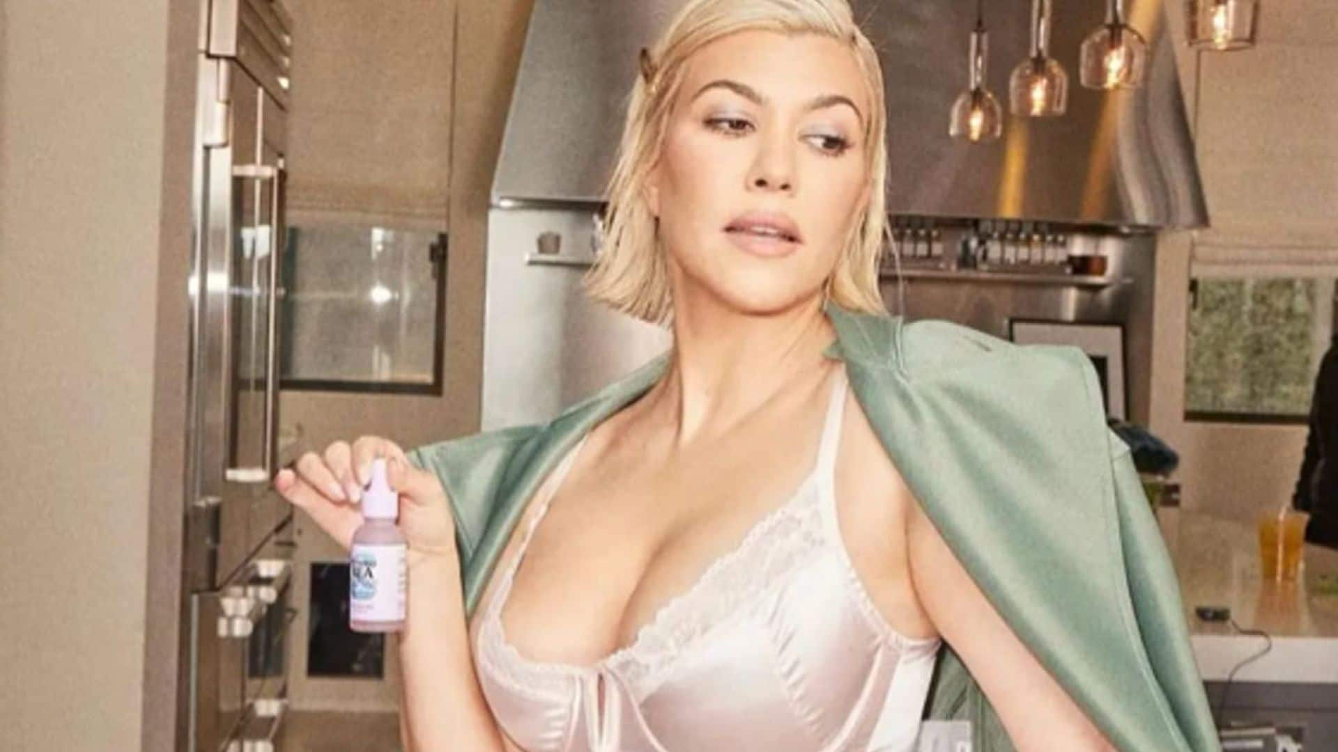 Kourtney Kardashian poses in silk lingerie ensemble: ‘Marilyn Monroe vibes’