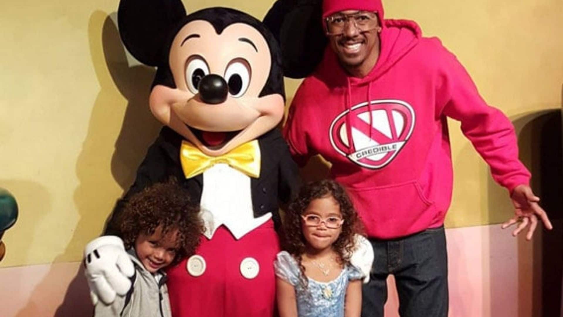 Nick Cannon's fun day out with Monroe and Moroccan: Disneyland and Chuck E. Cheese