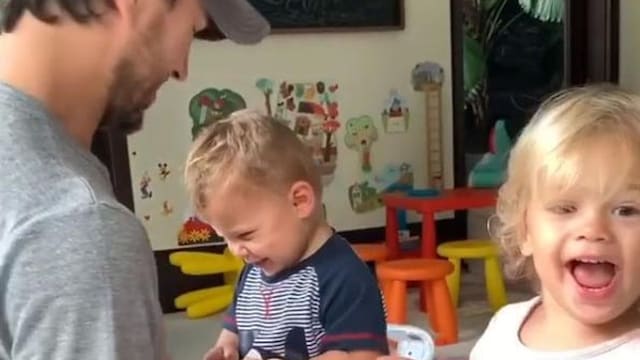 Enrique Iglesias' twins tickle dad in cute video