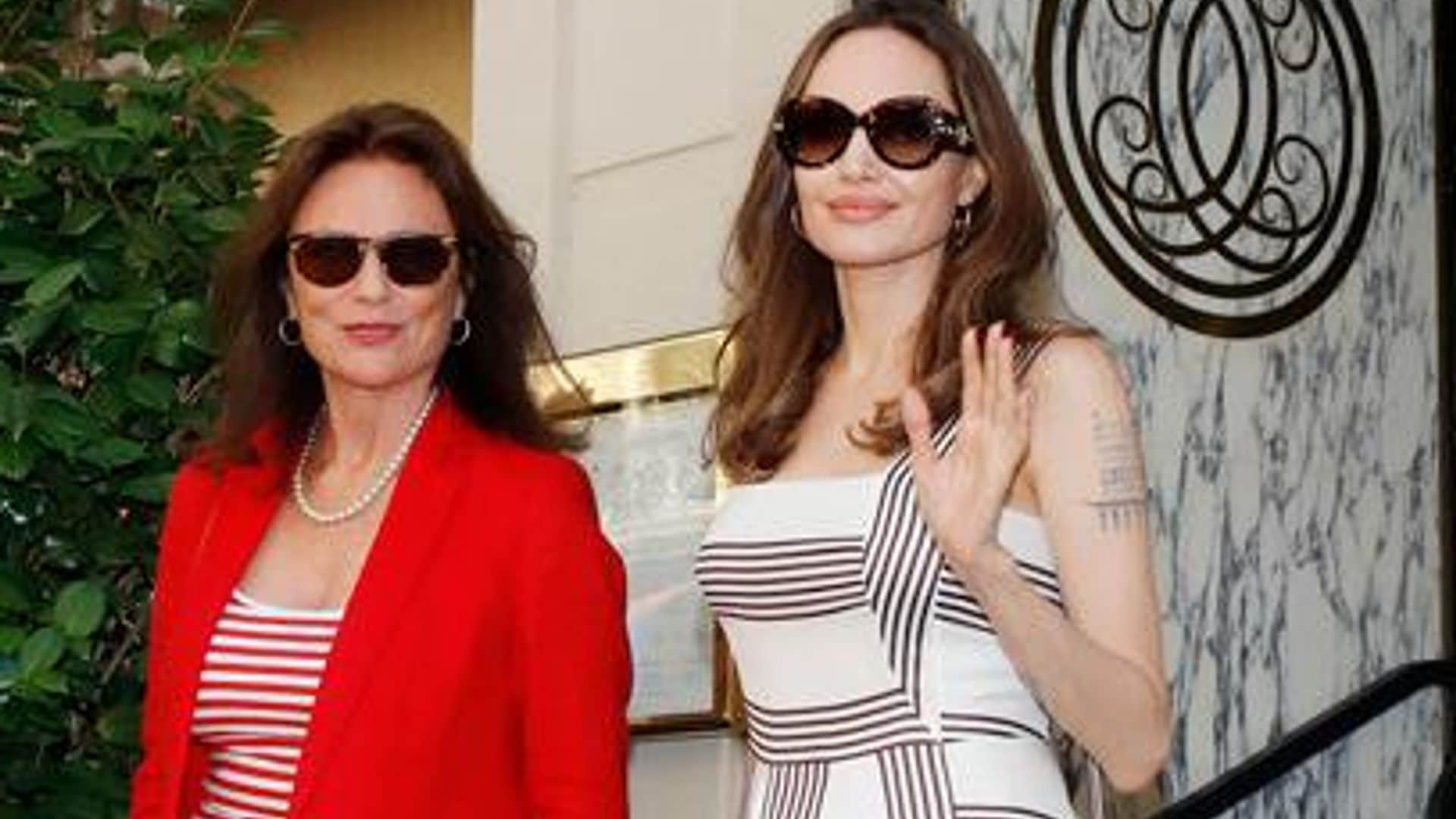 Angelina Jolie and her godmother take on Parisian elegance with a series of twinning looks