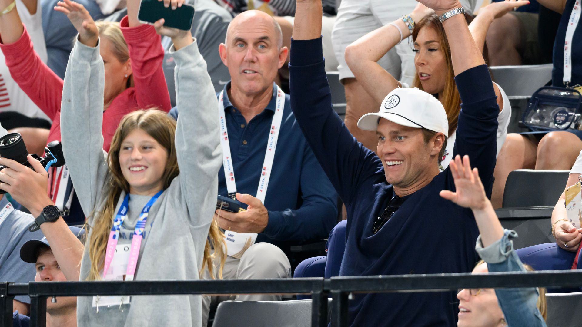 Girl dad, Tom Brady, and daughter Vivian cheer on gymnastics legend Simone Biles