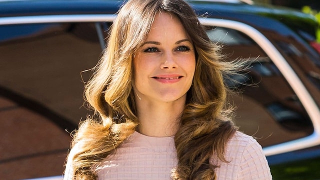 Princess Sofia of Sweden shows off her growing baby bump in DVF dress