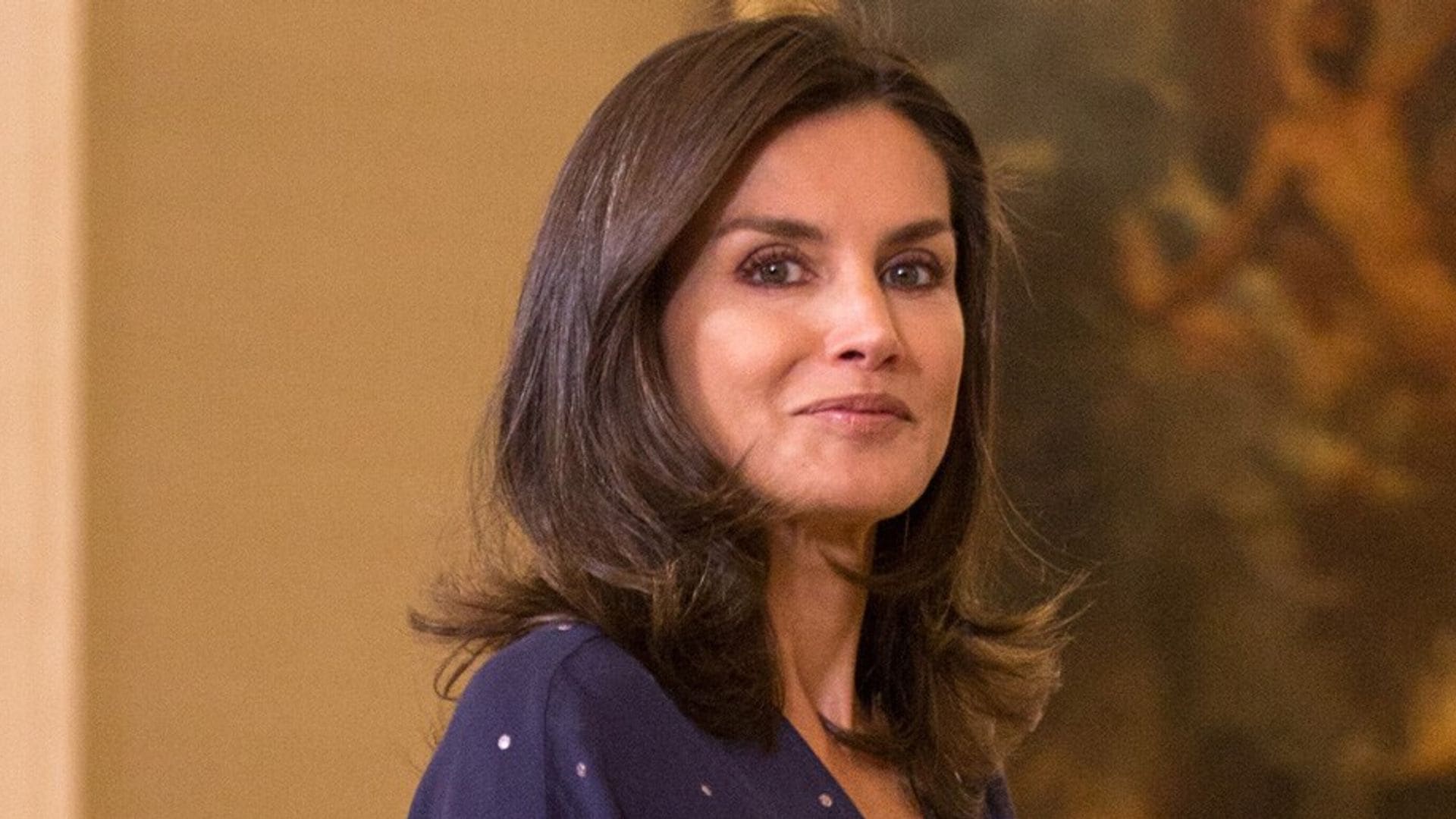 Queen Letizia shows off toned legs as she returns to royal duties in Madrid