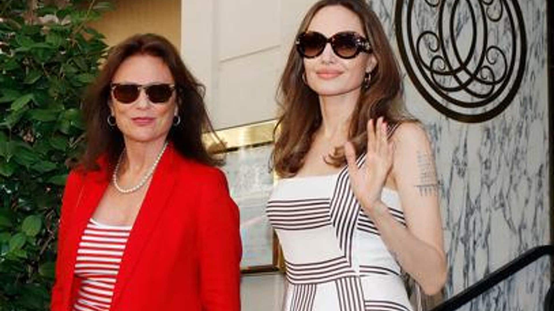 Angelina Jolie and her godmother take on Parisian elegance with a series of twinning looks