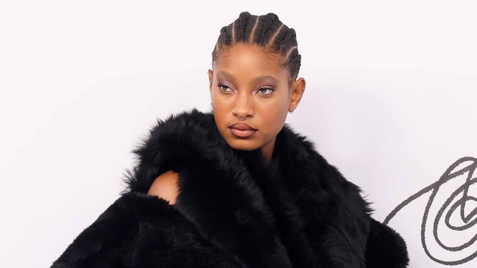 Willow Smith traded her signature braids and curly locks for a sleek long ponytail