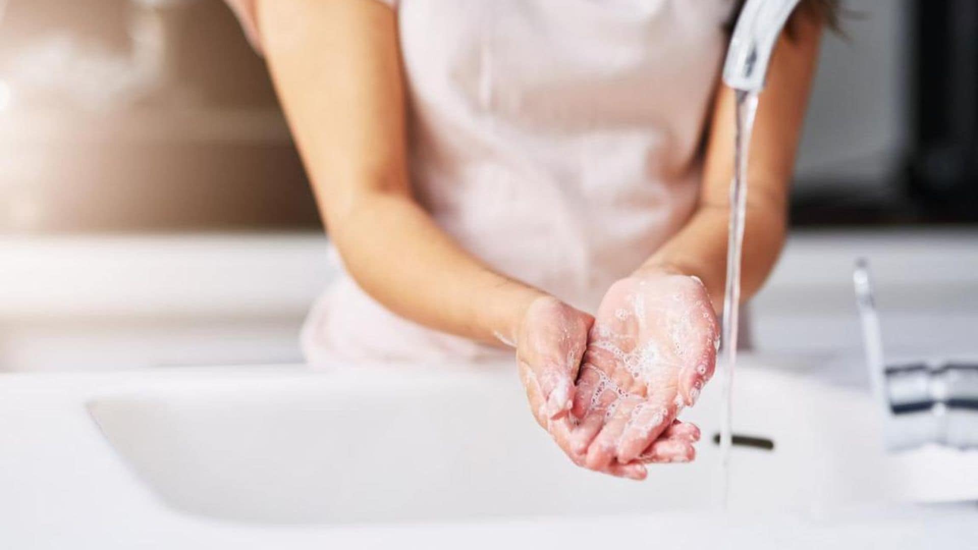 Woman washing her hands