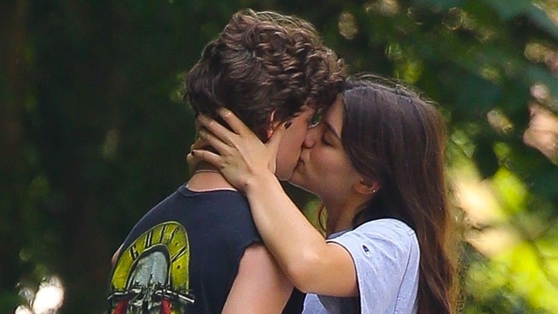 Suri and her boyfriend share some PDA in the park