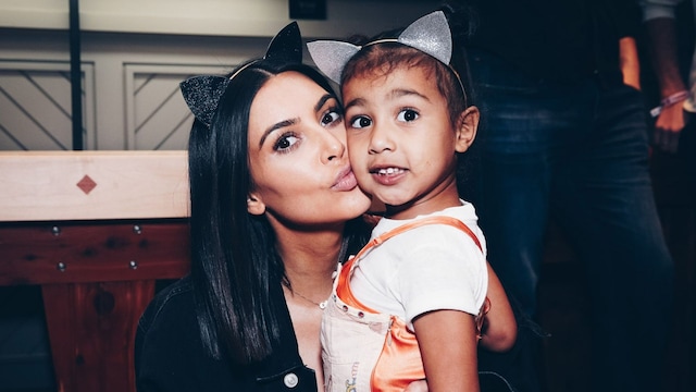 Kim Kardashian and North West at an event