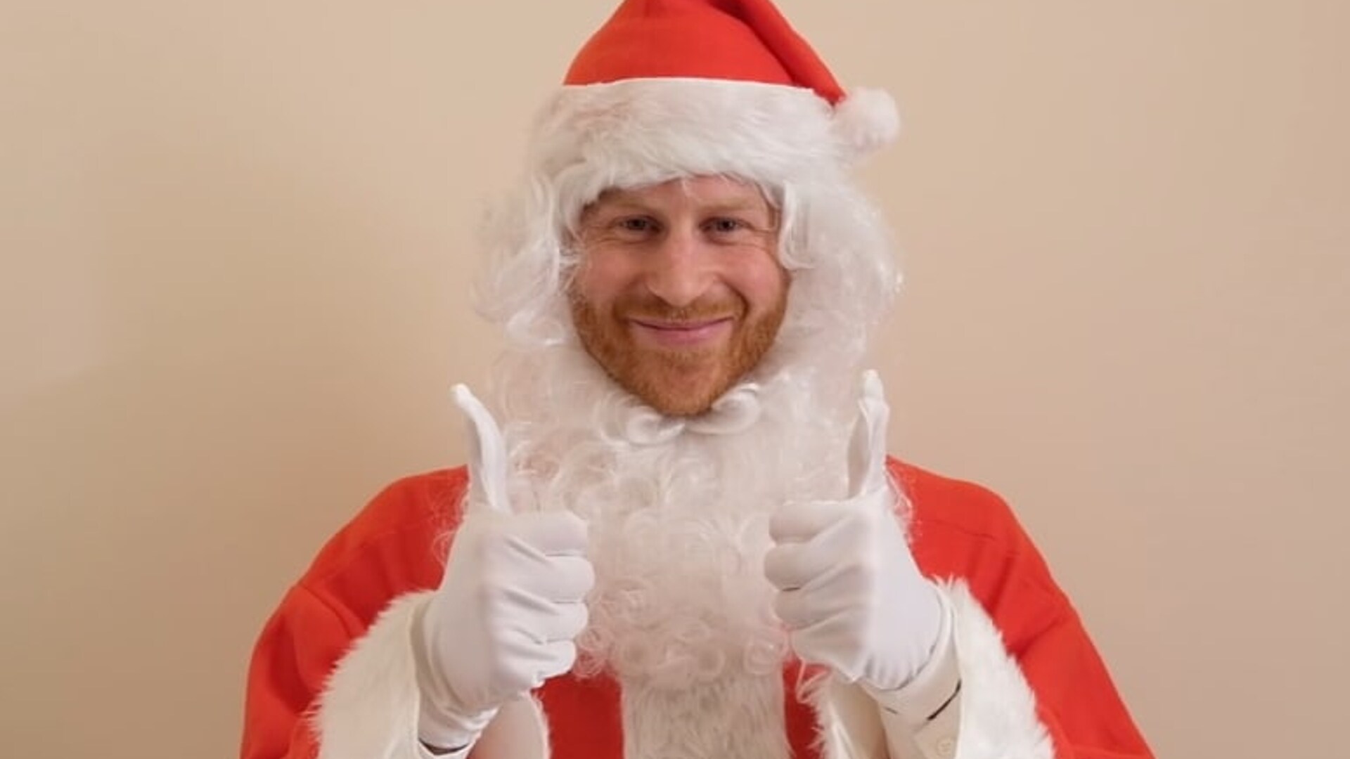 Prince Harry dresses up as Santa for charity Christmas party