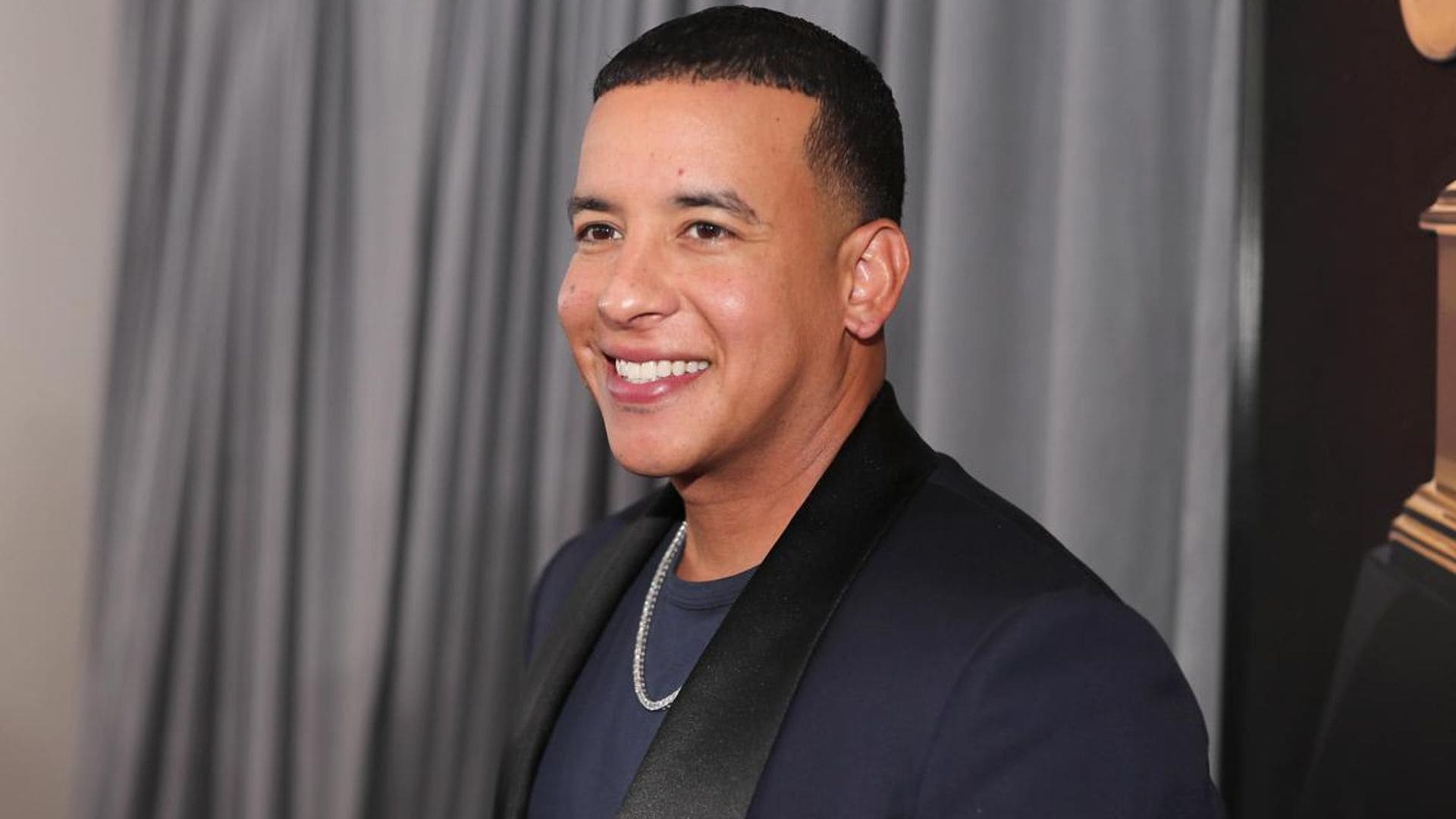 Daddy Yankee shares a sweet photo of him and his father to deliver a heartfelt message to his fans