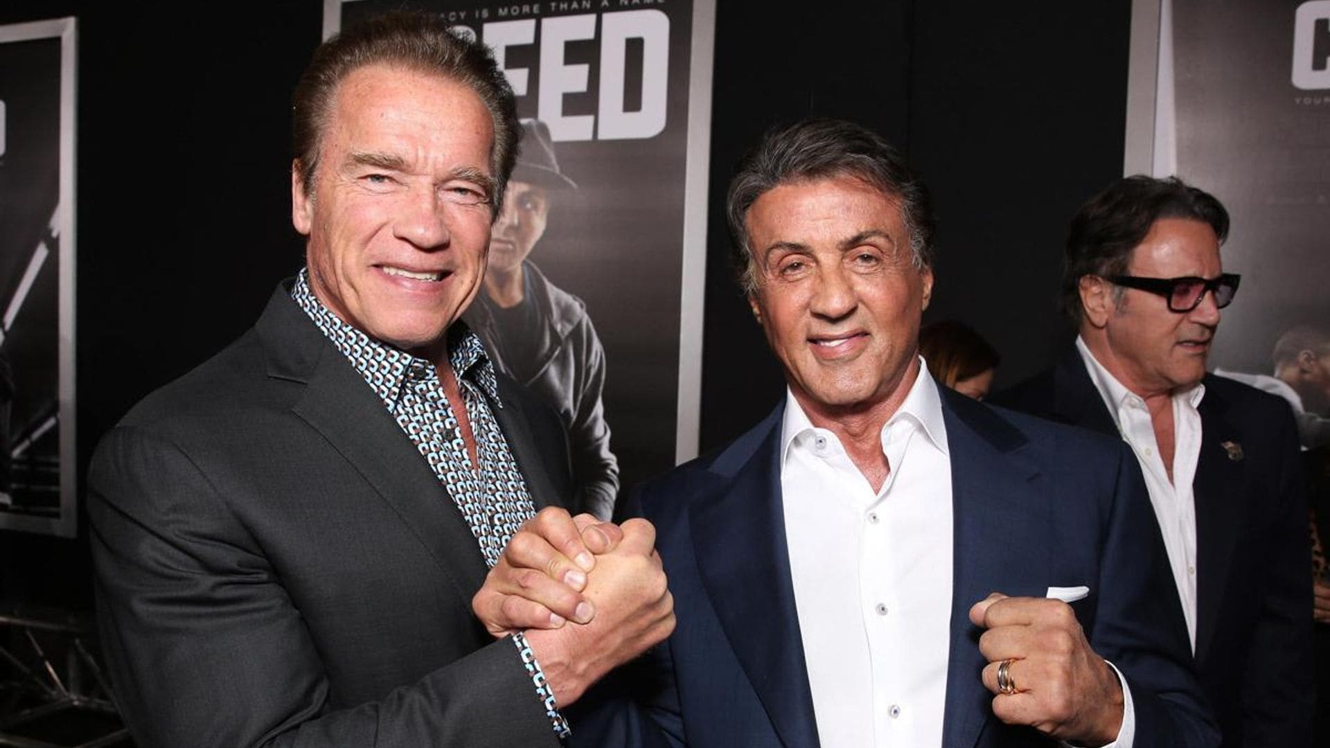 Arnold Schwarzenegger & Sylvester Stallone get together for some pumpkin carving