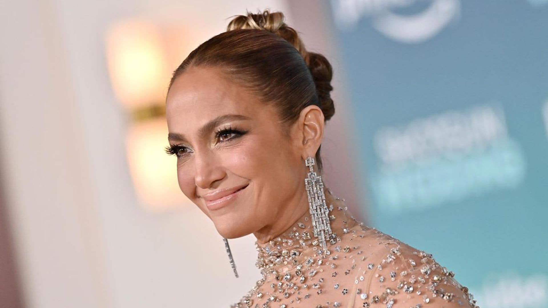 What was Jennifer Lopez doing while Marc Anthony was getting married to Nadia Ferreira?