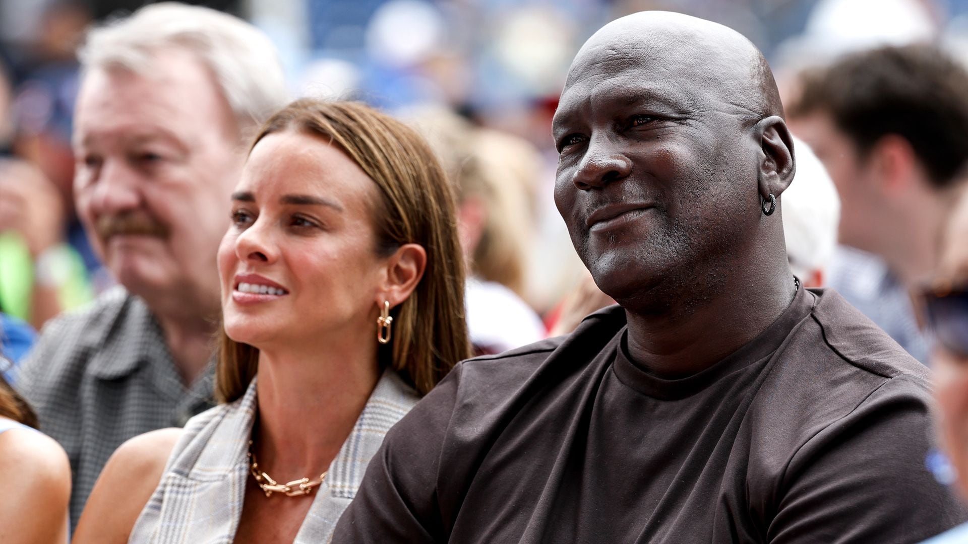 Michael Jordan and Yvette Prieto playfully dance while on vacation