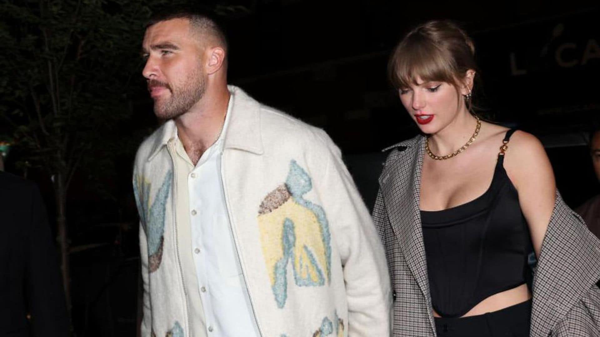 Taylor Swift and Travis Kelce celebrate Kansas City Chiefs’ win with champagne