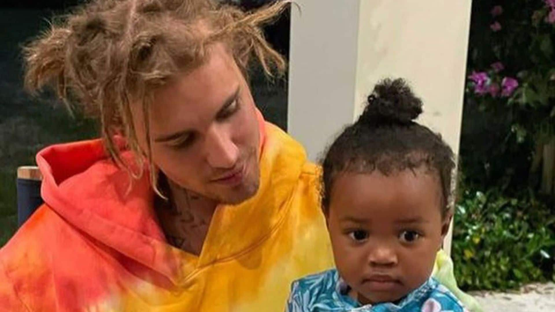 Justin Bieber poses with Jiselle, 21 months, and Jason, 3, who are the kids of his frequent musical collaborator Jason "Poo Bear" Boyd