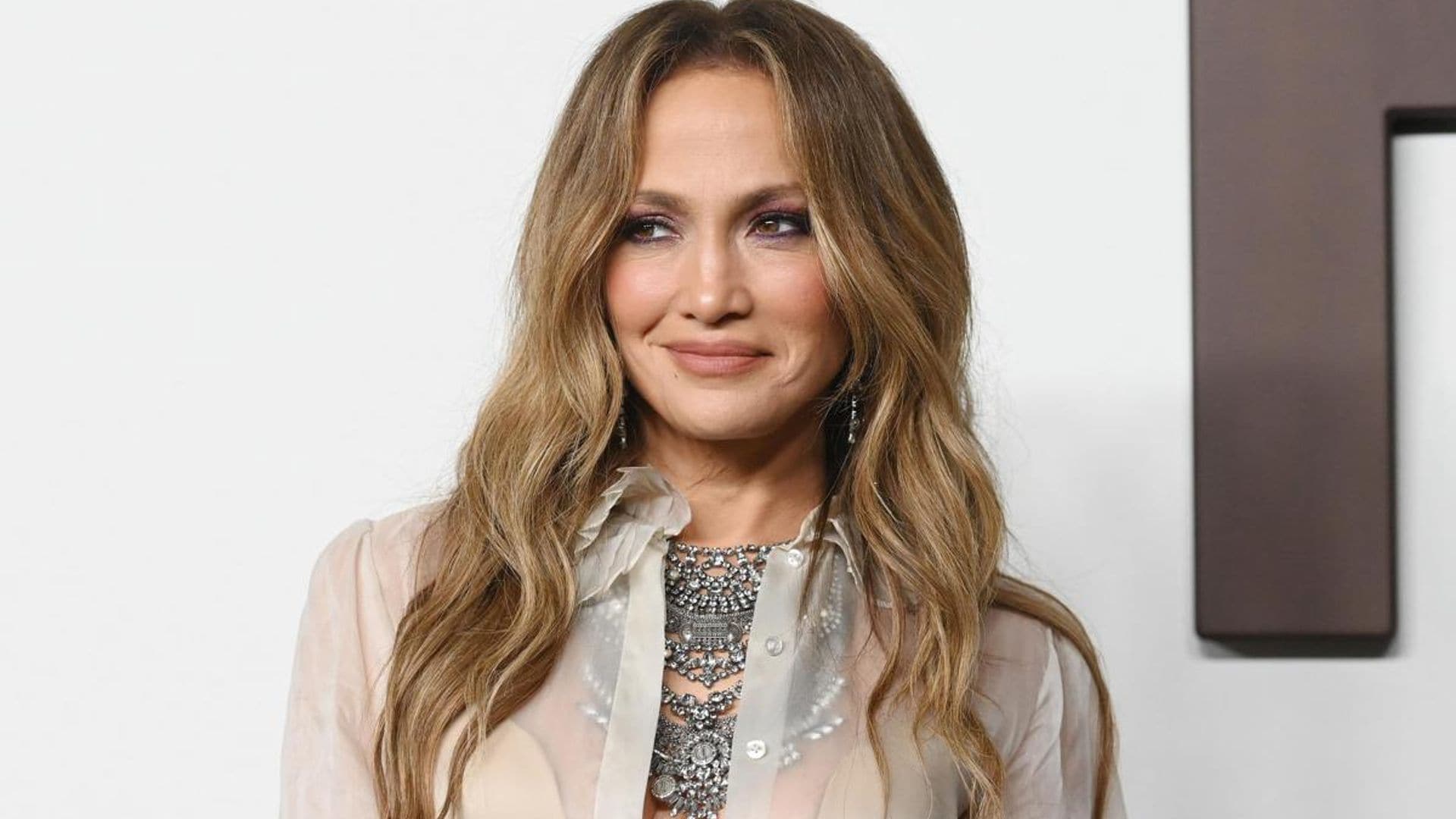 Jennifer Lopez poses in revealing Valentino ensemble