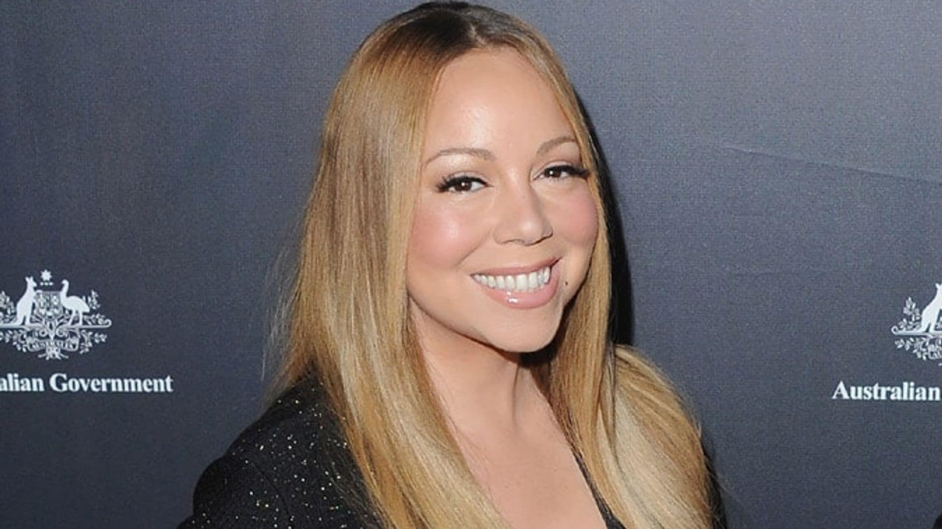 Mariah Carey flashes her amazing engagement ring on the red carpet