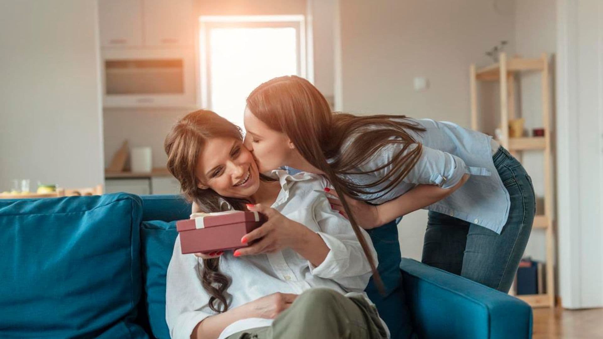 Happy Mother's Day! Beautiful Daughter Is Giving Gift Box to Her Mother