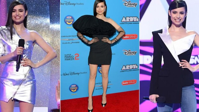 Sofia Carson llevo cuatro disenos con escote asimetrico mientras animaba A Radio Disney Music Celebration